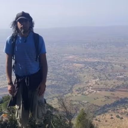 Kabir, trekking guide, overlooking the Essaouira countryside
